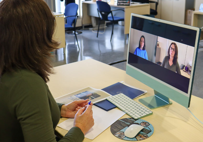 event image:Two people on an online meeting.